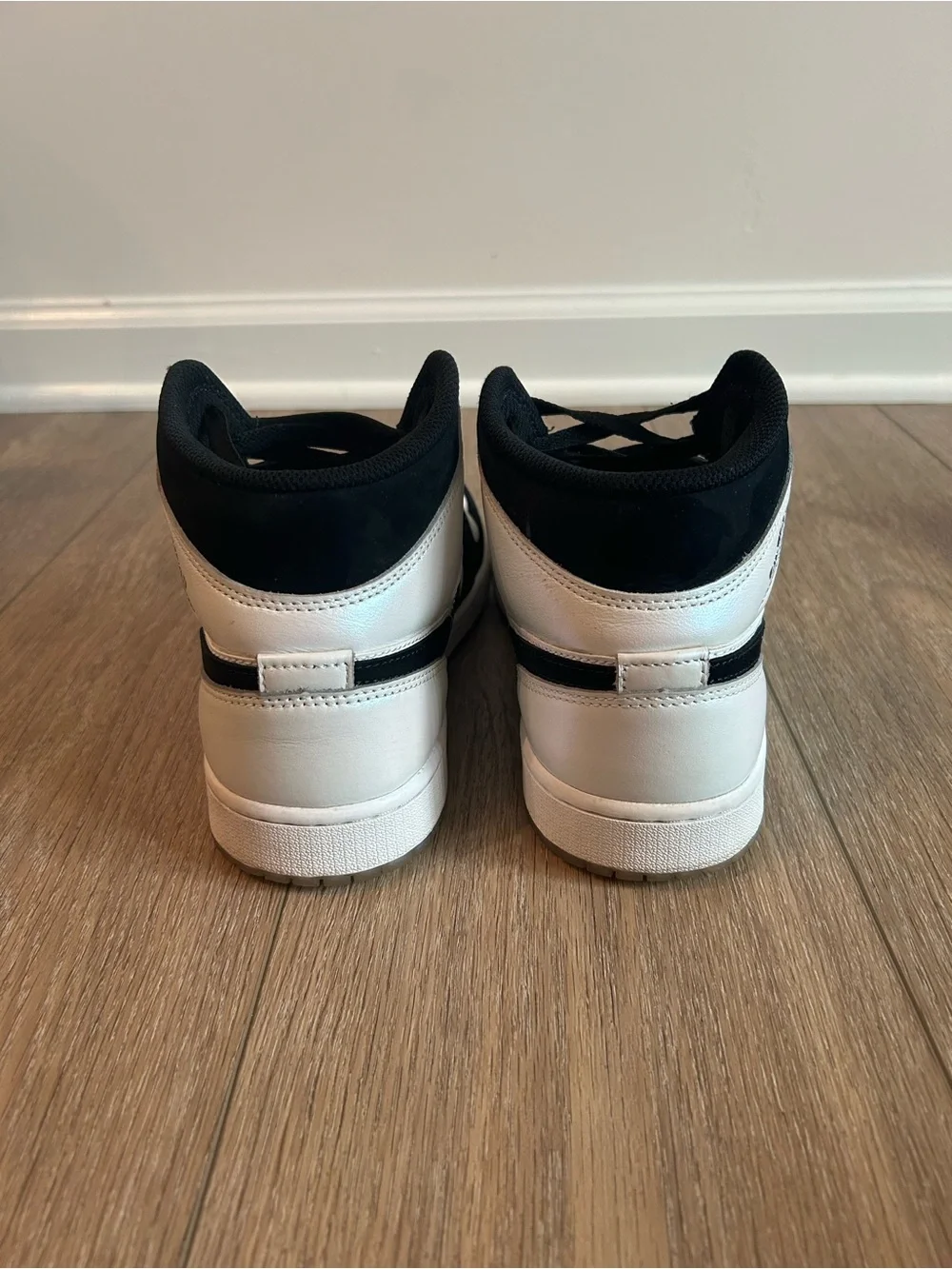Nike Black and White Mid-Top Sneakers